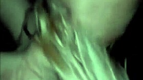 A couple shares an intimate oral moment at home.