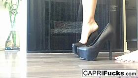 capri in high heels posing