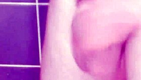 a gay guy jerks off in the bathroom, spanking his ass and cumming hard