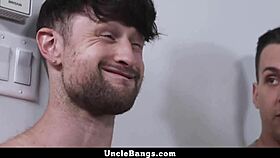 Young guys play a game on wall and chair, the loser faces suggestive consequences