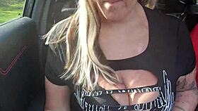 Pinky pussy flashes her big shaved tits to lads while driving, teasing with horny homemade fun.
