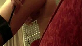 Amateur sexy blonde MILF with big tits fingers her wet pussy deeply.