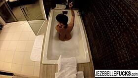 jezebelle bond films her big tits and pussy masturbation in the bath