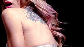 Tattooed milf sarah stuffs her pussy with a red toy