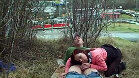 Watching a redhead with perfect tits piss outdoors in public