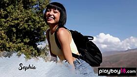 skinny brunette muse sophia shows her small 18+ tits on hilltop outdoor