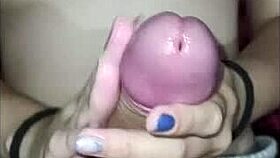 handjob with egg on the boy's dick complete on red
