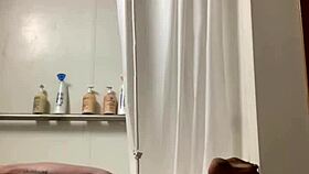 Trans woman gives herself an enema