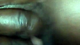 rubbing body oil on a black milf during a relaxing massage