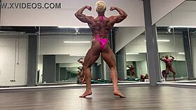 Huge ripped female bodybuilder tears her clothes