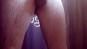 She enjoys a relaxing solo bath in the shower, playing around.