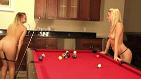 cute lesbian babe flaunts natural tits at billiard table