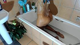 Ever seen a big-ass ebony babe bathing like this?
