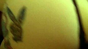 A Latina woman grabs her panties in a playful moment.