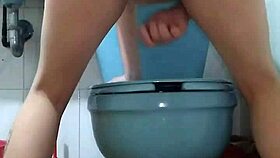 A horny latina prostitute masturbates in the shower, squirting passionately.