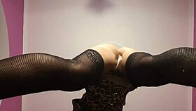 blonde woman engages in face sitting activity with another person in a bdsm setting