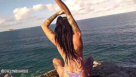 Amateur girl masturbates pussy on public Florianópolis beach