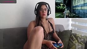 sexy latina plays video game while fingering her petite pussy