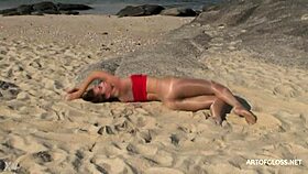 i saw monika in shiny pantyhose on the beach from artofgloss net