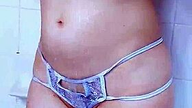 this petite latina teen in the shower shows off her small tits and ass