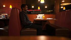 Indian Guy Enjoys American Breakfast Outdoors