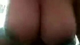 In this narrative, an Indian woman with huge tits and prominent nipples presses her massive boobs together in a sensual display.