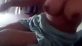 In this narrative, an Indian woman with huge tits and prominent nipples presses her massive boobs together in a sensual display.