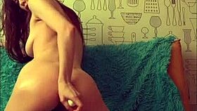 beautiful brunette playing with her tight anal hole