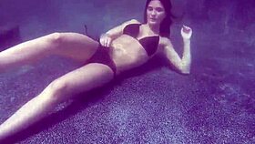 Molly Jane, the seductive mermaid, gets her clothes ripped in an underwater erotic scene.