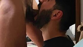 guy gives sloppy blowjob to his gay partner in the bedroom