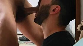 guy gives sloppy blowjob to his gay partner in the bedroom