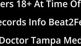 Giggles splashes her petite feet in the wet beach sand while sucking toes