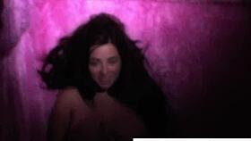 Taylor masturbates in her pink room, showing off big tits.