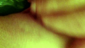 masturbating with a cucumber in private moment