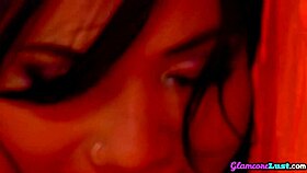 Asian glamorous lesbians engage in a licking activity