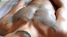 Black guy jerks off his cock in a casual blowjob scene