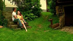 an amateur couple enjoys time outdoors in the garden