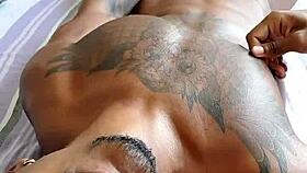 Black guy jerks off his cock in a casual blowjob scene