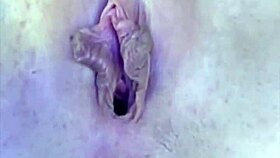 Ki-sim performs on webcam, reaching a powerful climax