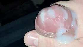 The guy strokes his huge cock during masturbation, leading to a cumshot