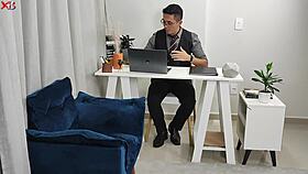 In the office, tattooed brunette secretary gives interracial blowjob.