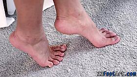 the fetish babe skillfully strokes a monster cock with her feet until explosive cumshot.