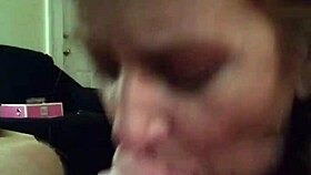 This beautiful wife is giving her husband an amazing blowjob, and it's so sexy.