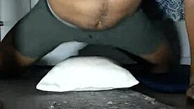 a muscular guy desperately humps his pillow, craving rough sex