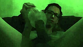 Intense gay play with toy in bold action.