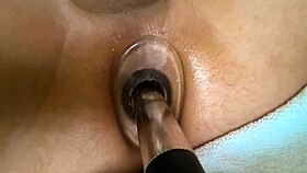 Check out this close-up anal tunnel with vibrator and dildo for intense masturbation