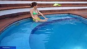 By the pool, she enjoys oral before a hard fuck with her stepsister.