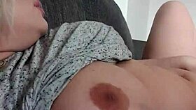 Blonde Bombshell Teases Her Big Tits While Masturbating