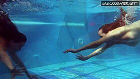 These russian lesbian pornstars get horny skinny dipping in the pool underwater