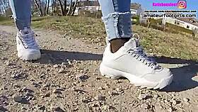 Girl Plays With Sweaty Fila Sneakers And Wet Nylons